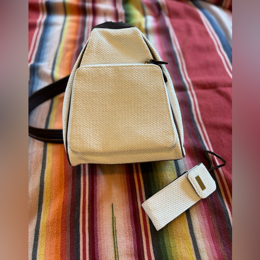 Elegant Cream color Textured Women's small backpack
